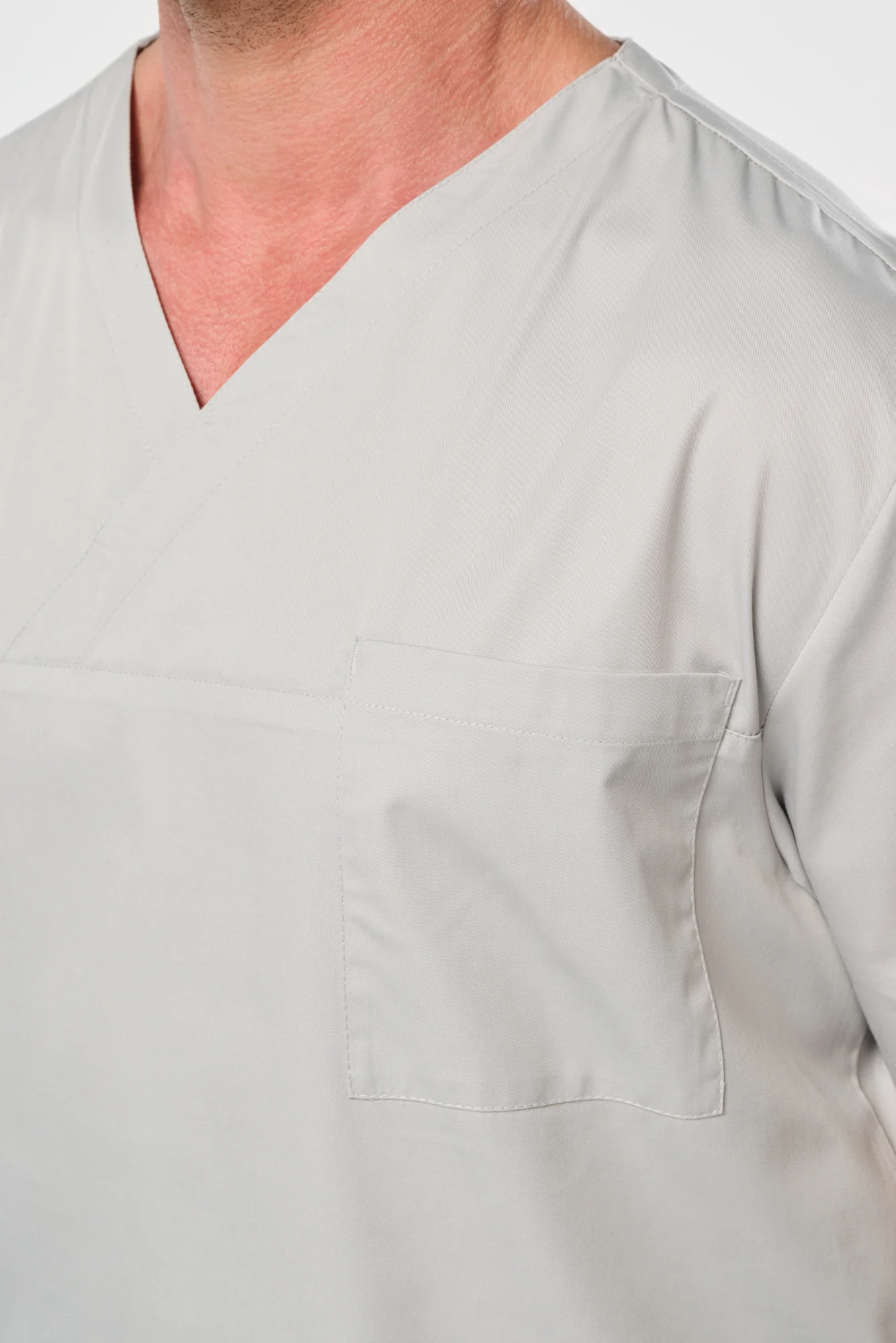 WK. Designed To Work Unisex tuniek met korte mouwen van polykatoen