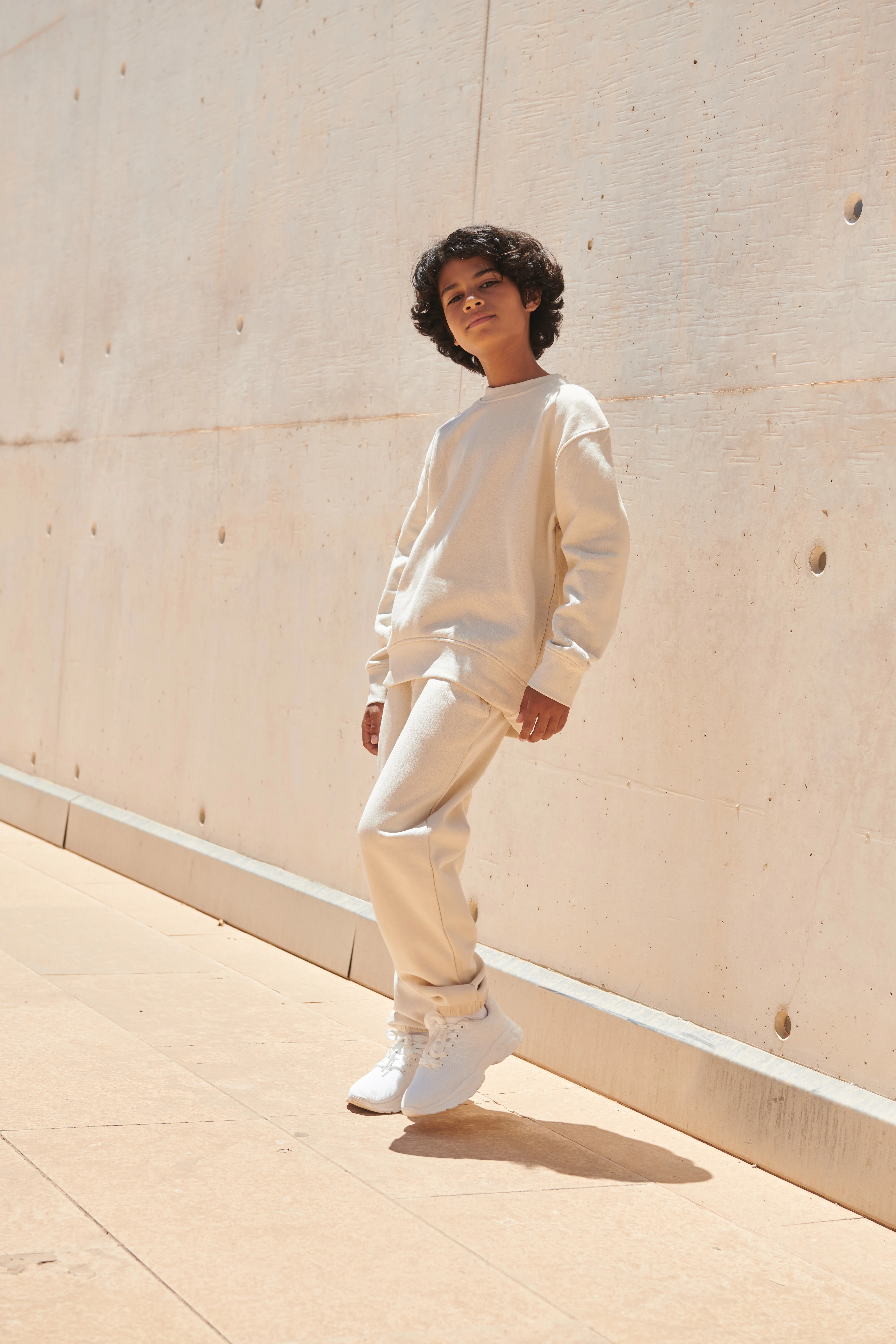 Kids sustainable fashion curved hem sweatshirt
