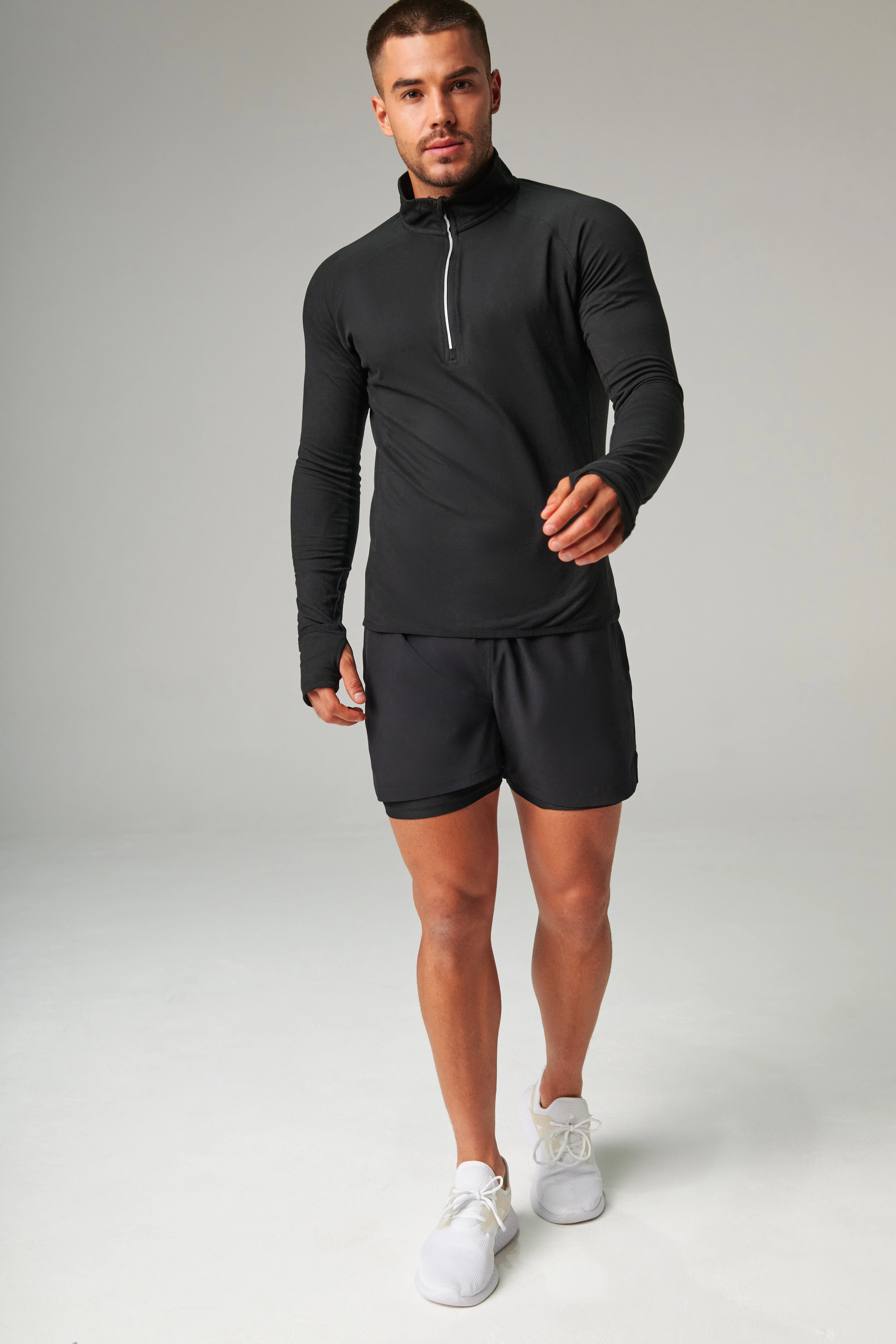 Long-sleeved ¼ zip top